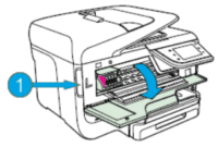 The carriage moves to the left side of the printer